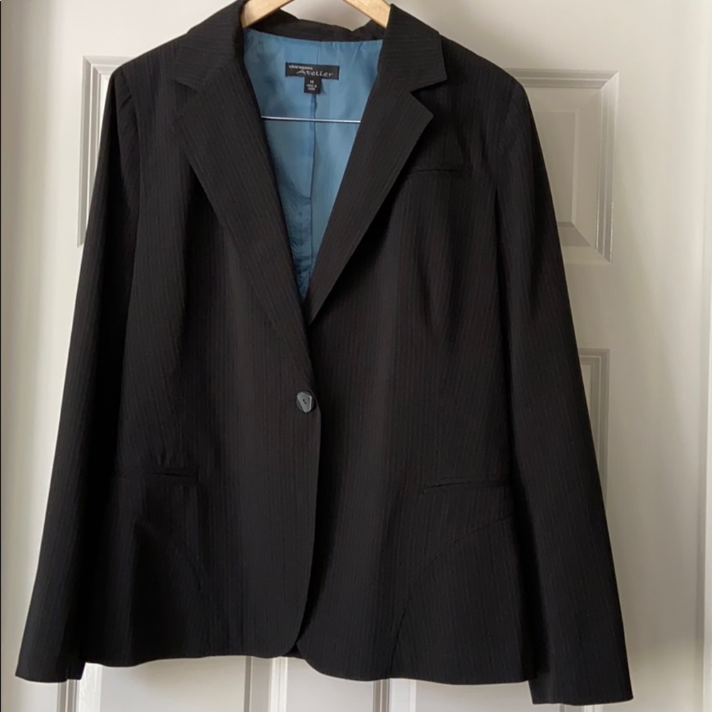 Women’s black pinstripe suit